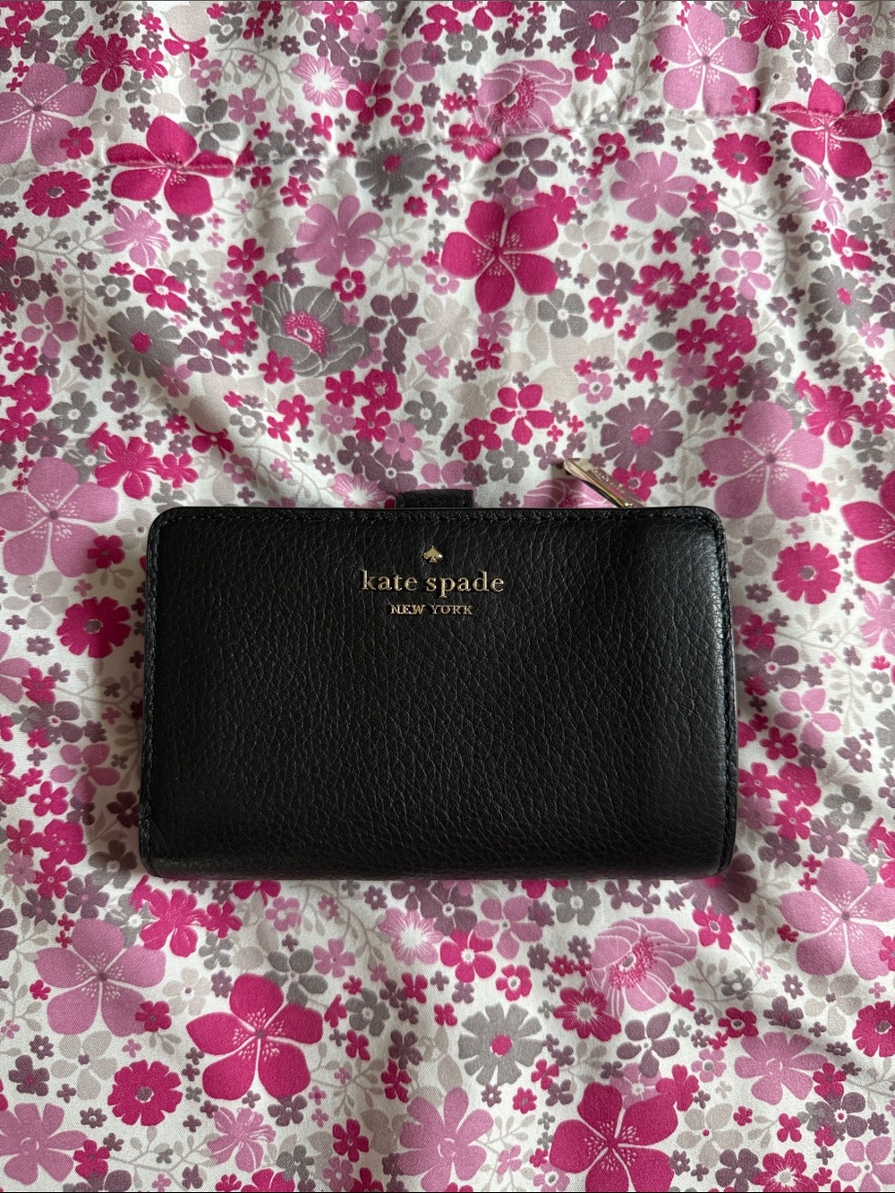 kate spade black leather zip-around wallet with gold logo
